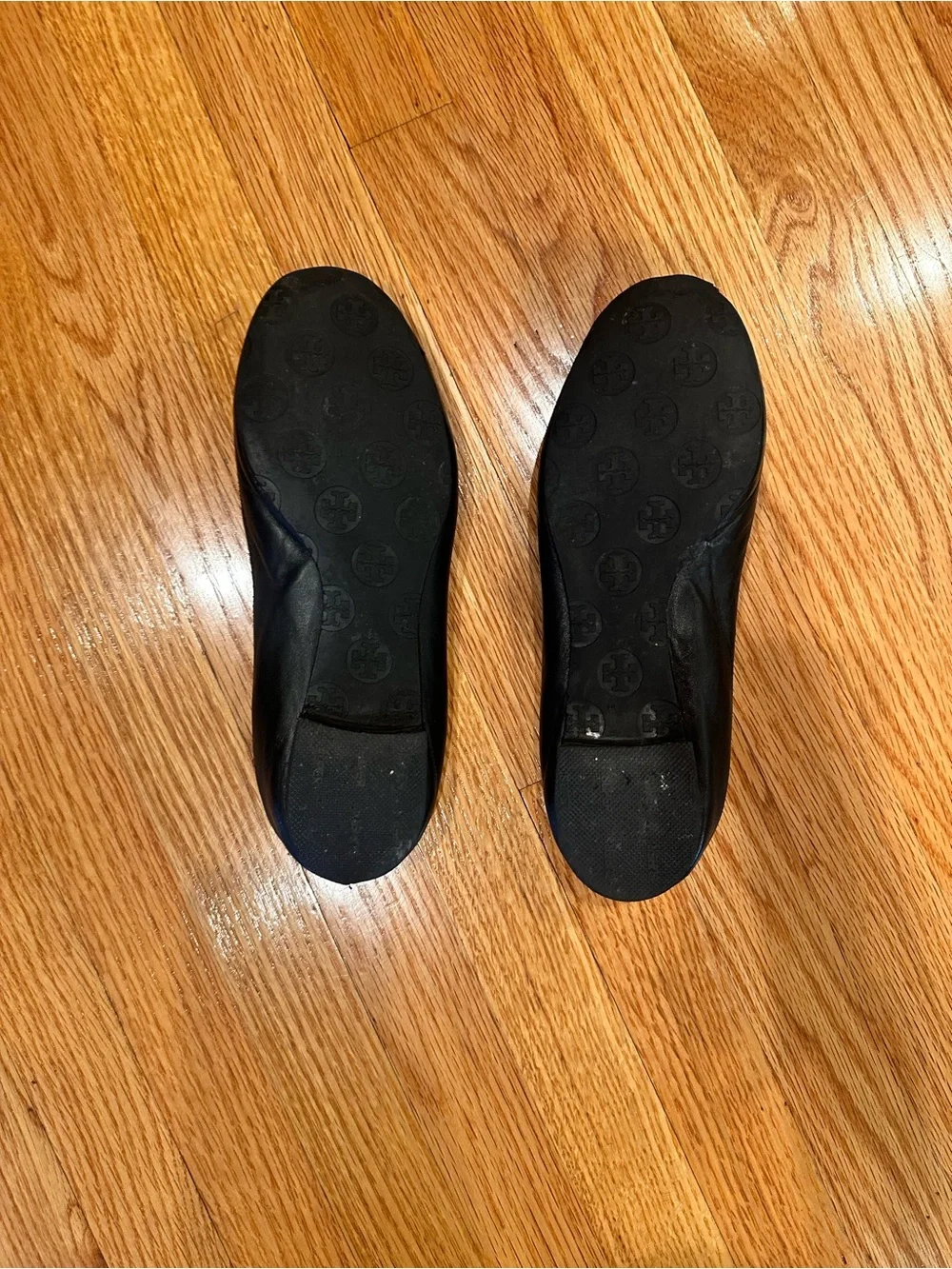 Tory Burch Black Leather Logo Ballet Flats with Silver Emblem